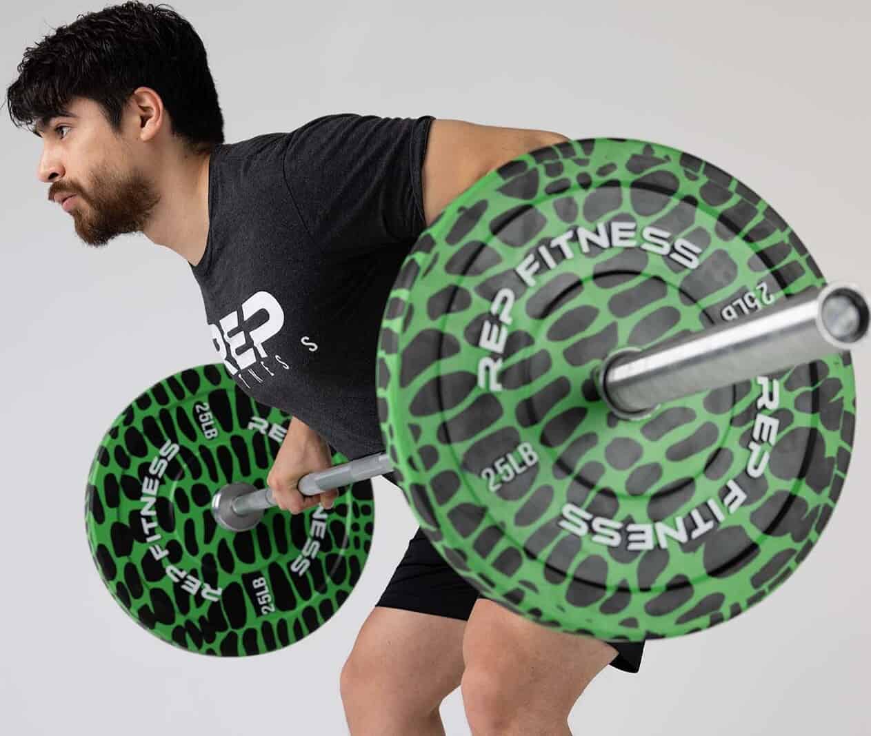 Rep Fitness Animal Print Bumper Plates with an athlete 1