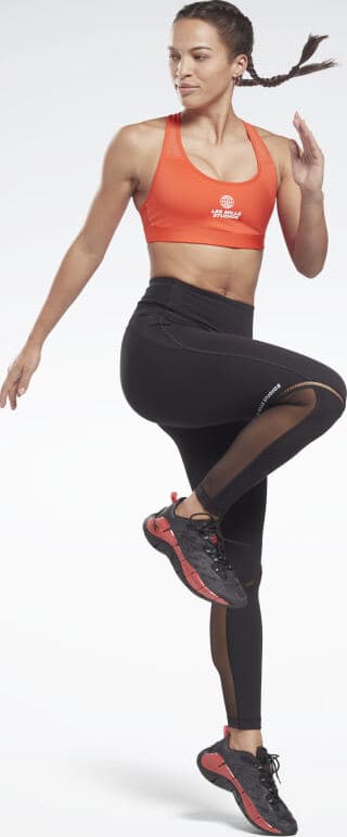 Reebok Les Mills Lux Racer Medium-Support Sports Bra worn jump