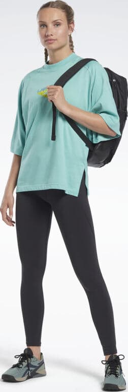 Reebok Les Mills Layering T-Shirt worn with a bag