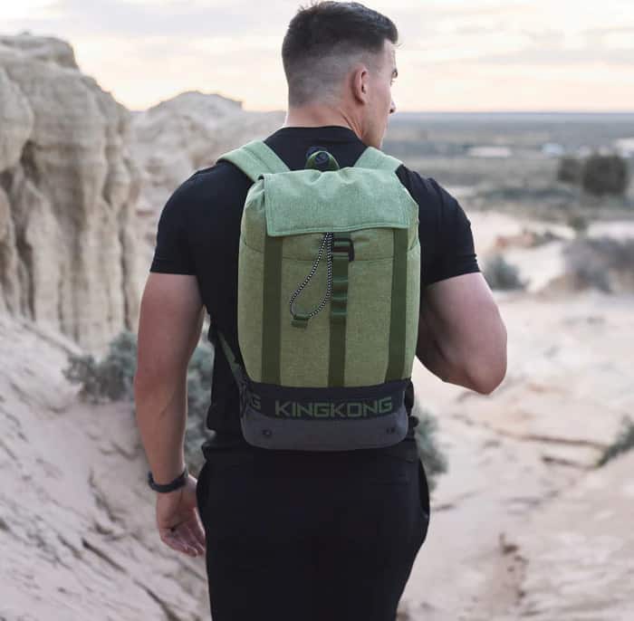 King Kong Apparel SURGE21 Backpack green worn by an athlete