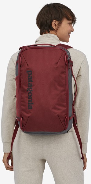 Patagonia Black Hole Mini MLC 26L Sequoia Red worn by an athlete