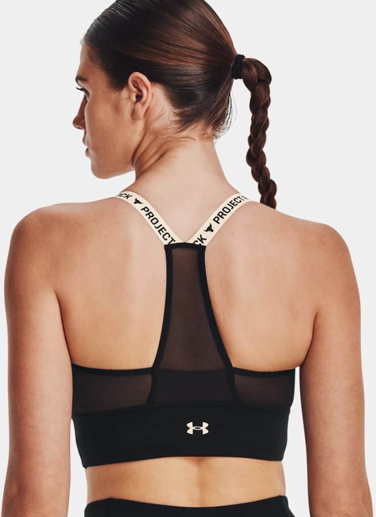Under Armour Womens Project Rock Infinity Mid Sports Bra worn back